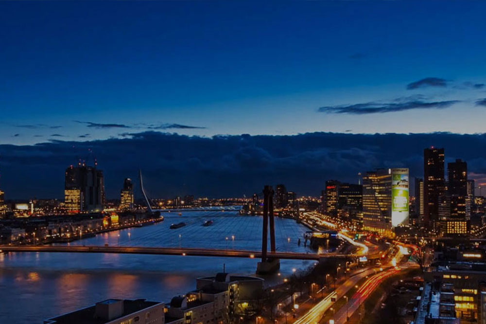 Big city from above in the dark with bridge