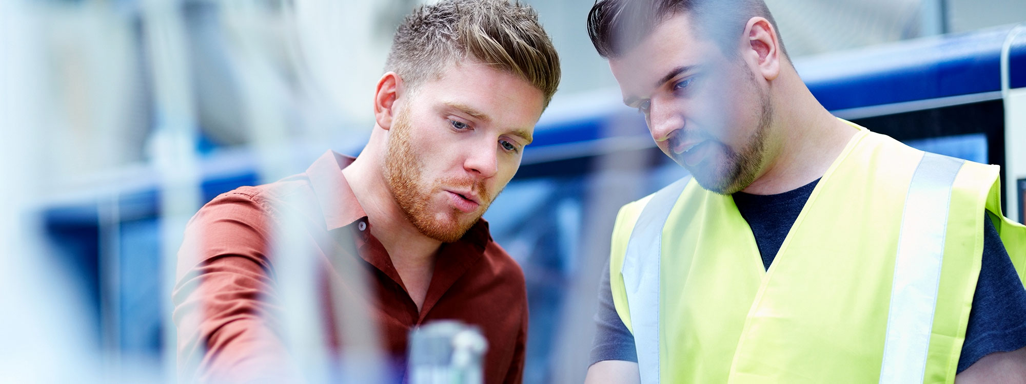 Two employees working together in the workshop