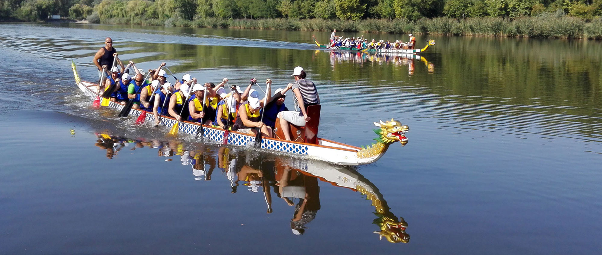 Several people during a canoe trip on the lake