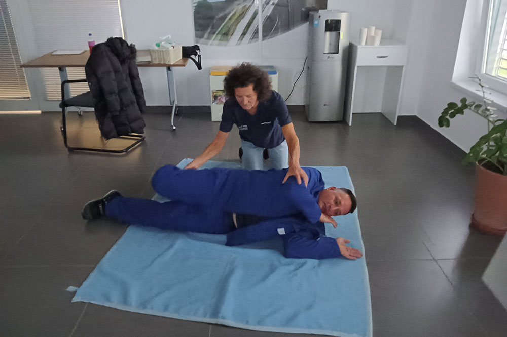 Employee practices first aid on another employee